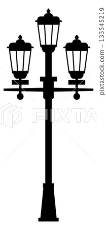 A black and white image of a street light pole with three lights on it 133545219