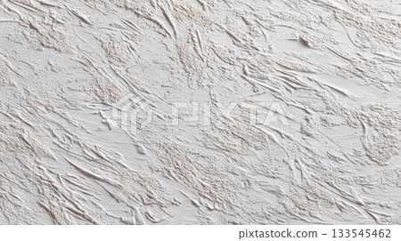 Textured white wall surface with subtle grooves and patterns in interior design setting 133545462