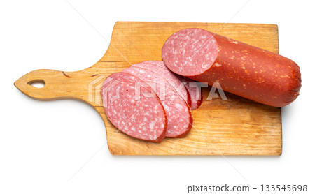 Smoked sausage on a kitchen board Smoked sausage on a kitchen board 133545698