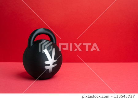 A weight with the Yen or Yuan symbol. Conceptually, it represents the burden of debt and economic problems. Financial stress and economic risk. Investment, banking and macroeconomic reports. A weight with the Yen or Yuan symbol. Conceptually, it represents the burden of debt and economic problems. Financial stress and economic risk. Investment, banking and macroeconomic reports. 133545737