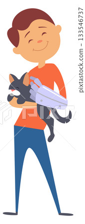 A boy is holding a cat in his arms A boy is holding a cat in his arms 133546737