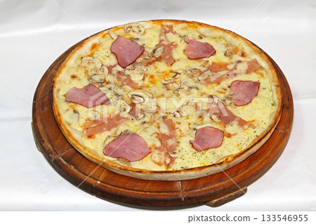 Pizza at Cutting Board Pizza at Cutting Board 133546955