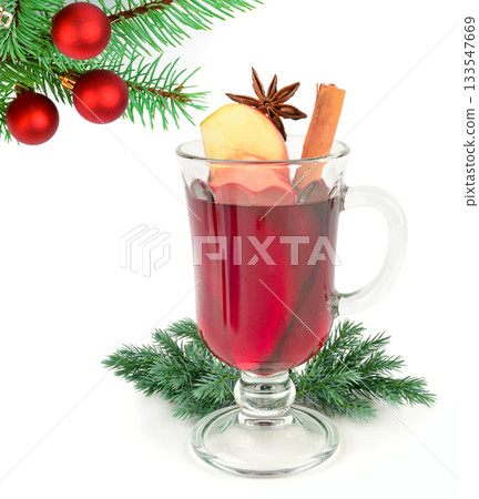 Mulled Wine with Spices and Christmas Decorations Isolated on White Mulled Wine with Spices and Christmas Decorations Isolated on White 133547669