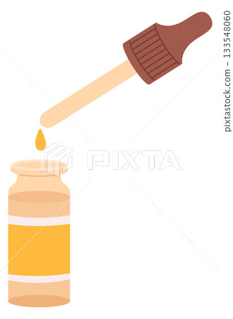 A bottle of liquid is being poured into a container A bottle of liquid is being poured into a container 133548060