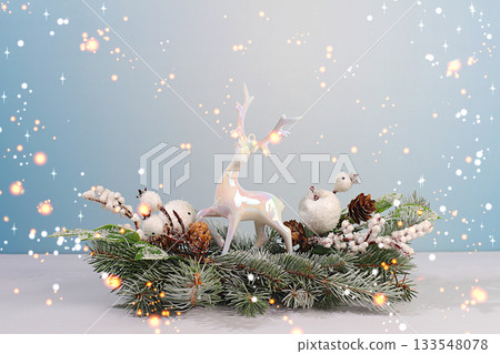 Festive winter greeting card and banner on the screen, Christmas decorations on spruce snowy branches, Christmas and New Year background with lights and decorations, layout for design, Happy New Year Festive winter greeting card and banner on the screen, Christmas decorations on spruce snowy branches, Christmas and New Year background with lights and decorations, layout for design, Happy New Year 133548078
