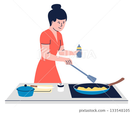 A woman is cooking breakfast in a kitchen A woman is cooking breakfast in a kitchen 133548105