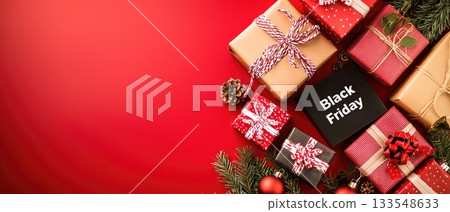 A torn piece of paper showcases bold lettering announcing Black Friday, hinting at special shopping deals and discounts 133548633