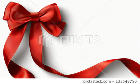 A vibrant red bow with a silky ribbon lies against a clean white backdrop, perfect for adding charm to gifts and decorations A vibrant red bow with a silky ribbon lies against a clean white backdrop, perfect for adding charm to gifts and decorations 133548750