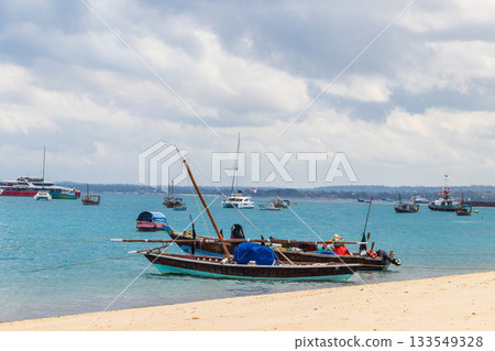 Boats in a port of Stone Town, Zanzibar, Tanzania Boats in a port of Stone Town, Zanzibar, Tanzania 133549328