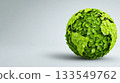 Creative representation of Earth made from green leaves, showcasing nature and environmental awareness in a simple design 133549762