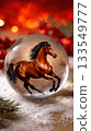 Beautiful brown horse sculpture inside crystal ball surrounded by holiday decorations and snow 133549777