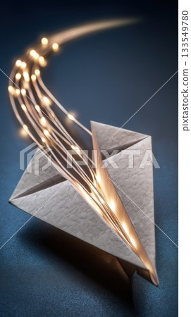 Creative paper airplane with glowing lights soaring against a dark background 133549780