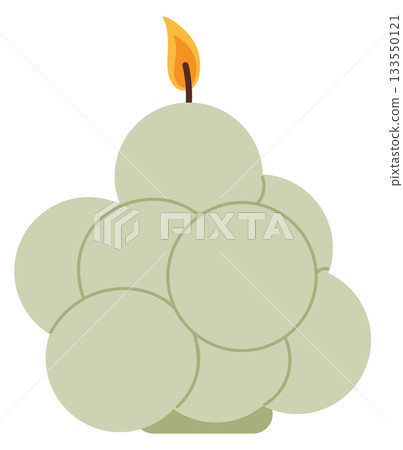A candle with a yellow flame sits on a white background 133550121
