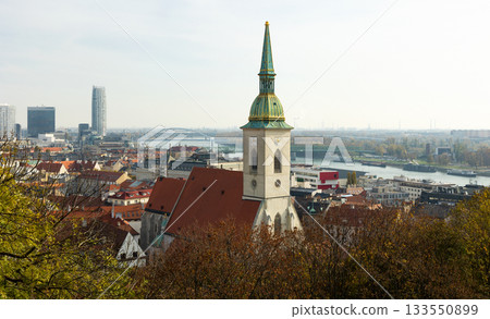 View of St. Martin Cathedral in historic district of Bratislava on autumn day 133550899