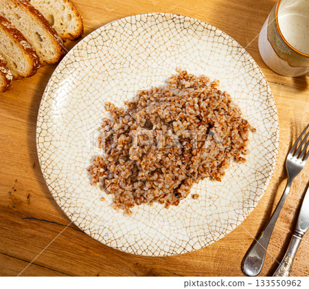Buckwheat porridge served on plate Buckwheat porridge served on plate 133550962