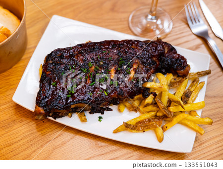 American style fried ribs with potatoes American style fried ribs with potatoes 133551043