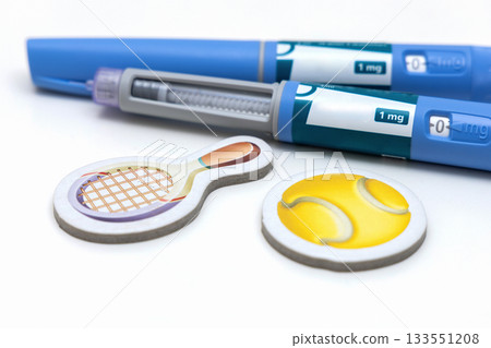 Weight loss concept Ozimpic shot with sports items Weight loss concept Ozimpic shot with sports items 133551208