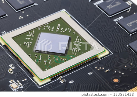 Close up modern printed circuit Board with Advanced Graphic Processing Unit. Electronic Devices Production. Close up modern printed circuit Board with Advanced Graphic Processing Unit. Electronic Devices Production. 133551438