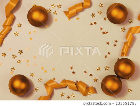 Scattered gold baubles and curled ribbons with confetti on pale blue surface, creating airy festive scene for holiday marketing and seasonal product styling. Xmas background, card with copy space Scattered gold baubles and curled ribbons with confetti on pale blue surface, creating airy festive scene for holiday marketing and seasonal product styling. Xmas background, card with copy space 133551785