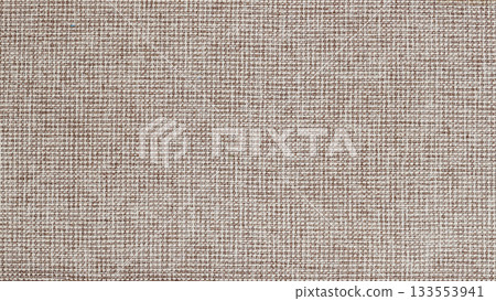 Jute fabric texture background. Close-up of brown woven canvas texture with clear thread pattern. Natural background with rustic and craft textile appearance Jute fabric texture background. Close-up of brown woven canvas texture with clear thread pattern. Natural background with rustic and craft textile appearance 133553941