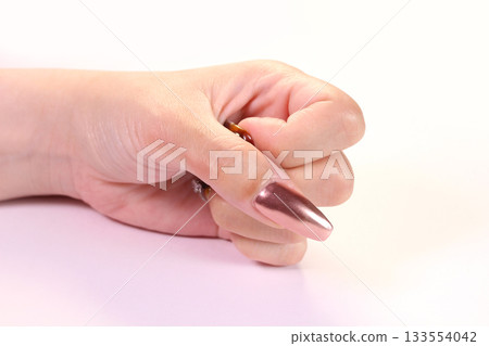 Hand of nailed women 133554042