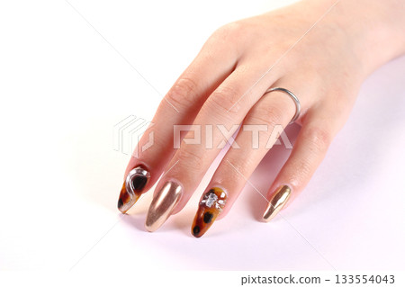 Hand of nailed women 133554043