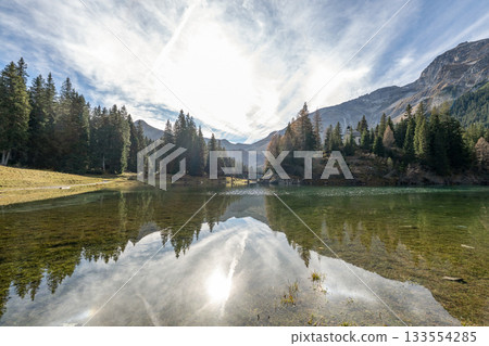 Chapel Maria by the lake Summer time at romantic forest Lake Obernberg scenic mountain lakes landscape in Austria, Tyrol Chapel Maria by the lake Summer time at romantic forest Lake Obernberg scenic mountain lakes landscape in Austria, Tyrol 133554285