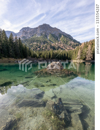 Summer time at romantic forest Lake Obernberg scenic mountain lakes landscape in Austria, Tyrol Summer time at romantic forest Lake Obernberg scenic mountain lakes landscape in Austria, Tyrol 133554287