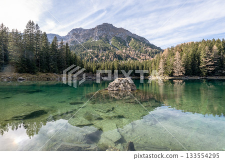 Summer time at romantic forest Lake Obernberg scenic mountain lakes landscape in Austria, Tyrol 133554295