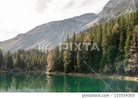 Summer time at romantic forest Lake Obernberg scenic mountain lakes landscape in Austria, Tyrol 133554303