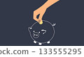 hand putting coin into piggy bank 133555295