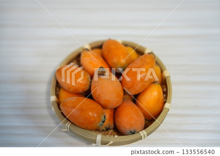 Fresh, ripe loquats 133556540
