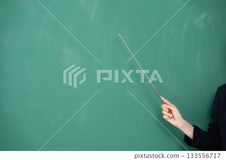 Blackboard, female instructor, pointer at hand 133556717