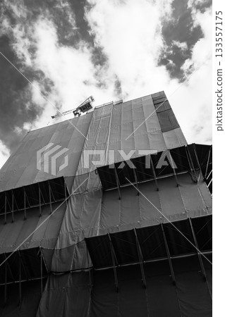 Building under construction and protective shelves to prevent falls, monochrome Building under construction and protective shelves to prevent falls, monochrome 133557175