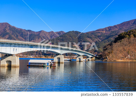 Kawaguchiko Bridge over Lake Kawaguchi in winter Kawaguchiko Bridge over Lake Kawaguchi in winter 133557839