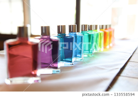 Beautifully arranged colored bottles Beautifully arranged colored bottles 133558594