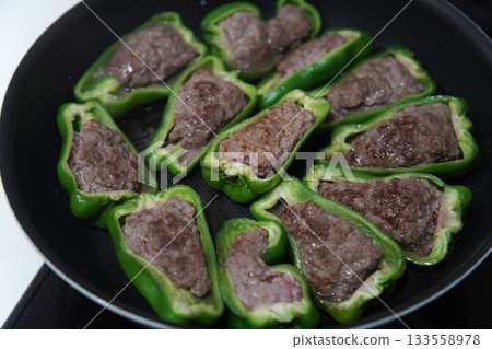 Making stuffed peppers Making stuffed peppers 133558978
