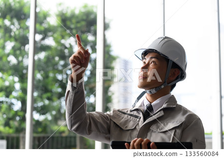 A man checking A man checking 133560084