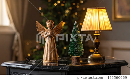 Black Marble Desk with Wooden Angel Figurine and Mini Christmas Tree, Vintage Table Lamp Black Marble Desk with Wooden Angel Figurine and Mini Christmas Tree, Vintage Table Lamp 133560669
