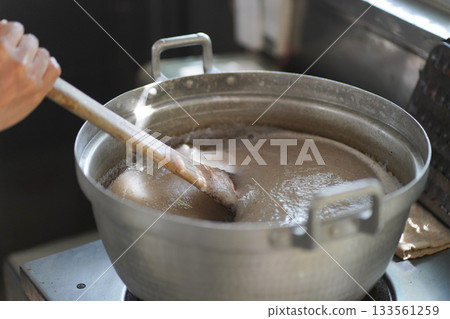 A man making konjac 133561259