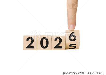 hand, finger flipping wooden cube block from year 2025 turn to year 2026. beginning and start of the new year 2026. Preparation for new year ,life, business, plan, goals, target and strategy concept. hand, finger flipping wooden cube block from year 2025 turn to year 2026. beginning and start of the new year 2026. Preparation for new year ,life, business, plan, goals, target and strategy concept. 133563379