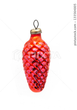 Vintage bright red textured glass Christmas tree ornament shaped like a pine cone, isolated on a white background Vintage bright red textured glass Christmas tree ornament shaped like a pine cone, isolated on a white background 133564805