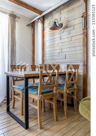 Wooden Dining Area with Soft Cushioned Chairs Wooden Dining Area with Soft Cushioned Chairs 133565125
