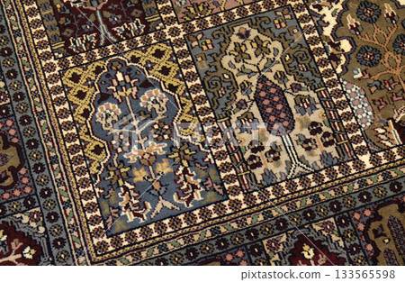 Handmade woven rug, oriental craft in Jaipur, Rajasthan, India Handmade woven rug, oriental craft in Jaipur, Rajasthan, India 133565598