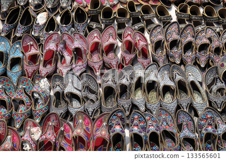Display of traditional shoes at the street market in Jaipur, Rajasthan, India 133565601