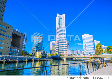 Yokohama cityscape, Japan, November 26th. In front of Sakuragicho Station. Views of Yokohama Landmark Tower and Nippon Maru. Towards tomorrow Yokohama cityscape, Japan, November 26th. In front of Sakuragicho Station. Views of Yokohama Landmark Tower and Nippon Maru. Towards tomorrow 133567094