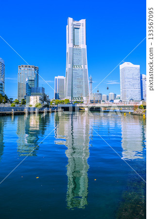 Yokohama cityscape, Japan, November 26th. In front of Sakuragicho Station. Views of Yokohama Landmark Tower and Nippon Maru. Towards tomorrow 133567095