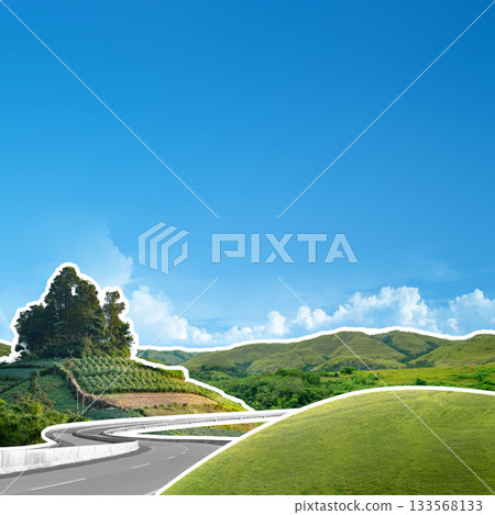 Beautiful landscape scenery with green hills and a curvy road on a blue sky background. Natural background Beautiful landscape scenery with green hills and a curvy road on a blue sky background. Natural background 133568133