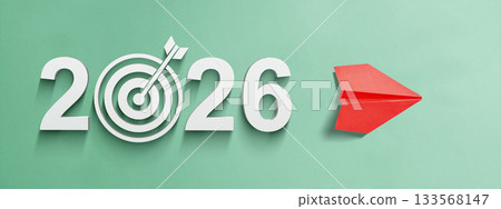 Number 2026 with an arrow on a target board and a paper airplane on a colored background. Happy New Year concept or Celebration. 2026 Goal Target Number 2026 with an arrow on a target board and a paper airplane on a colored background. Happy New Year concept or Celebration. 2026 Goal Target 133568147