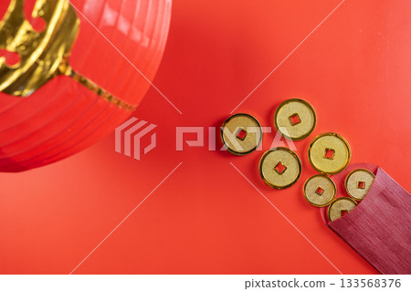 Red Chinese lantern with red envelopes or angpao and golden Chinese coins on a red background. Mockup, template, or copy space. Decoration for the Lunar or Chinese New Year celebration Red Chinese lantern with red envelopes or angpao and golden Chinese coins on a red background. Mockup, template, or copy space. Decoration for the Lunar or Chinese New Year celebration 133568376